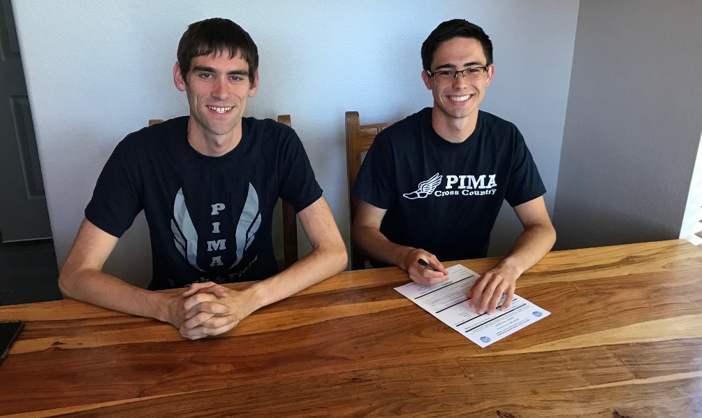 The Aztecs cross country and track & field programs signed Chalen Lozano (Marana HS). He set personal-records in the 5,000 meter race during the cross country season and the 1600 meter race during the track & field season this year. Photo courtesy of Chalen Lozano (right) with Cross Country Co-Head Coach and track assistant coach Mark Bennett
